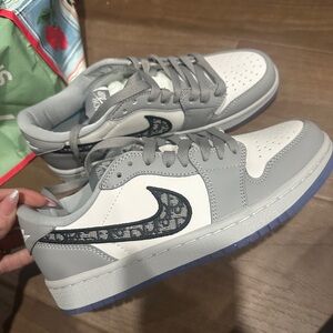 Gray and White Sneakers with designer Patterned Swoosh